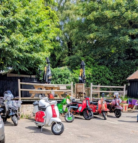 Mopeds Meet Parked By The Gate at the Chestnut Cafe, Sorrel Horse, Shottisham in Suffolk