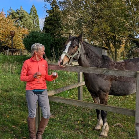 Lady Standing By Horse with Aspal The Sorrel Horse Inn at Shottisham, Suffolk